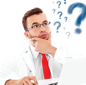 33006685 - a picture of an unhappy doctor with laptop and documents sitting in the office